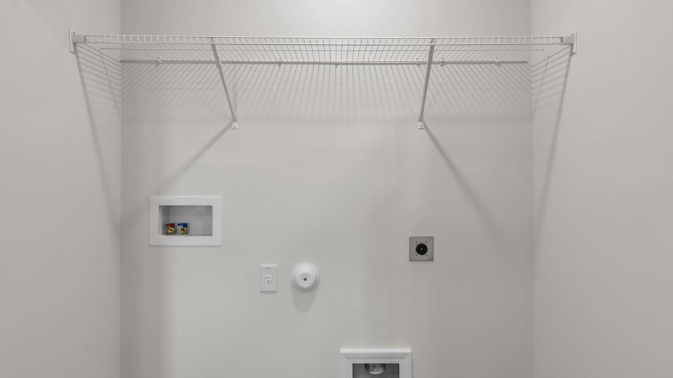 laundry room with wire shelving