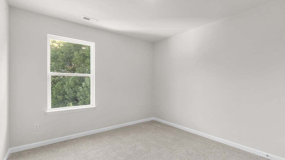 additional bedroom with window, carpeting, closet