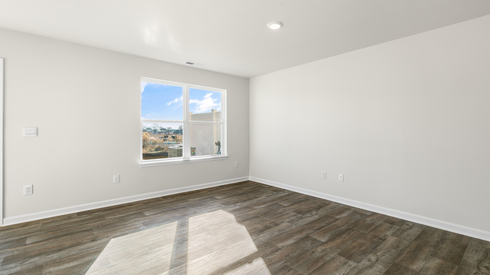 open concept living space with large windows