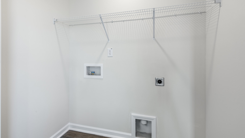 laundry room with wire shelving