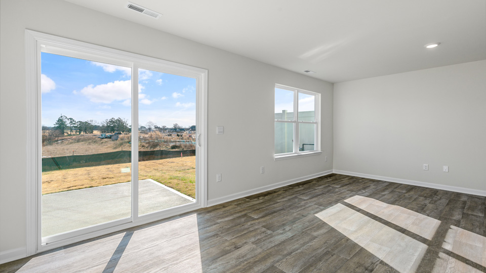 open concept living space with large windows