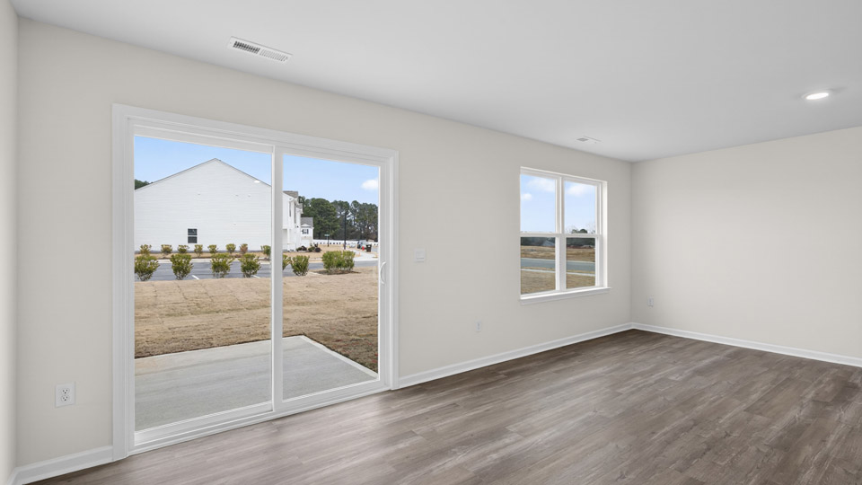 Sliding glass back door leading to back deck