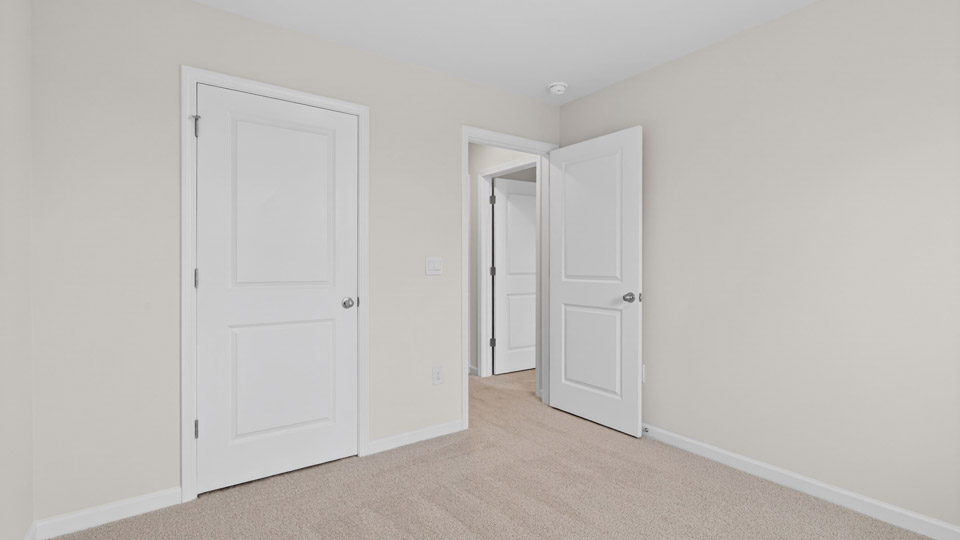 Bedroom with carpet floor and closet