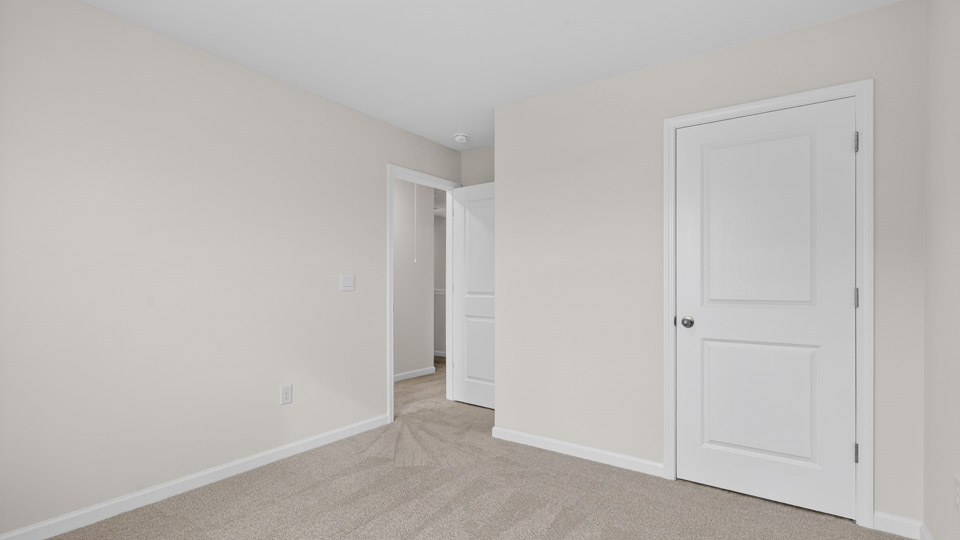Bedroom with carpet floor and closet