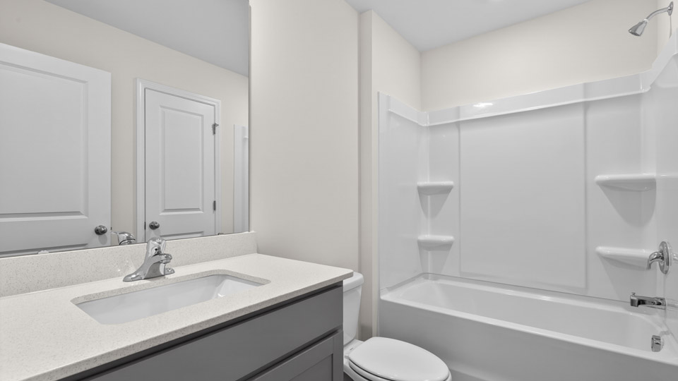 Bathroom with single sink and tub