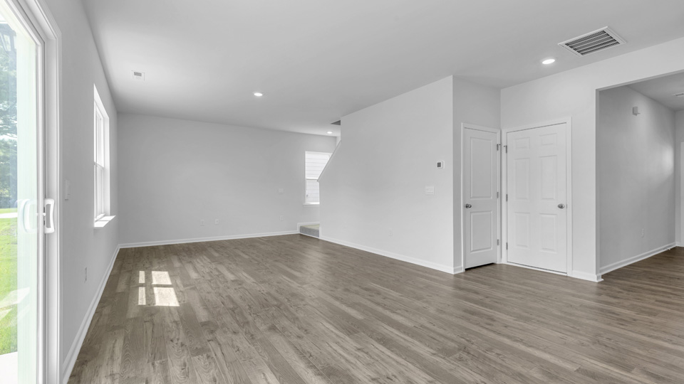 spacious living room with revwood flooring