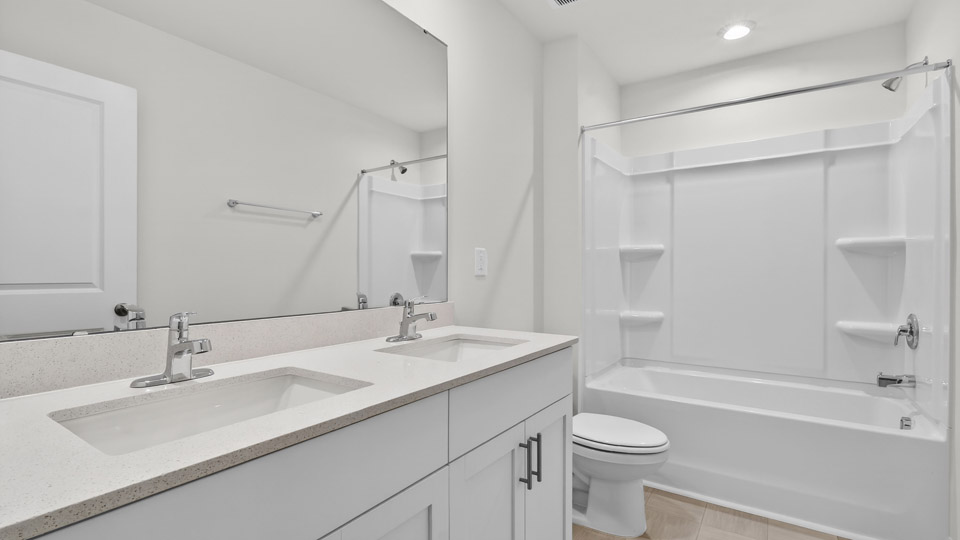 Bathroom with sink and tub