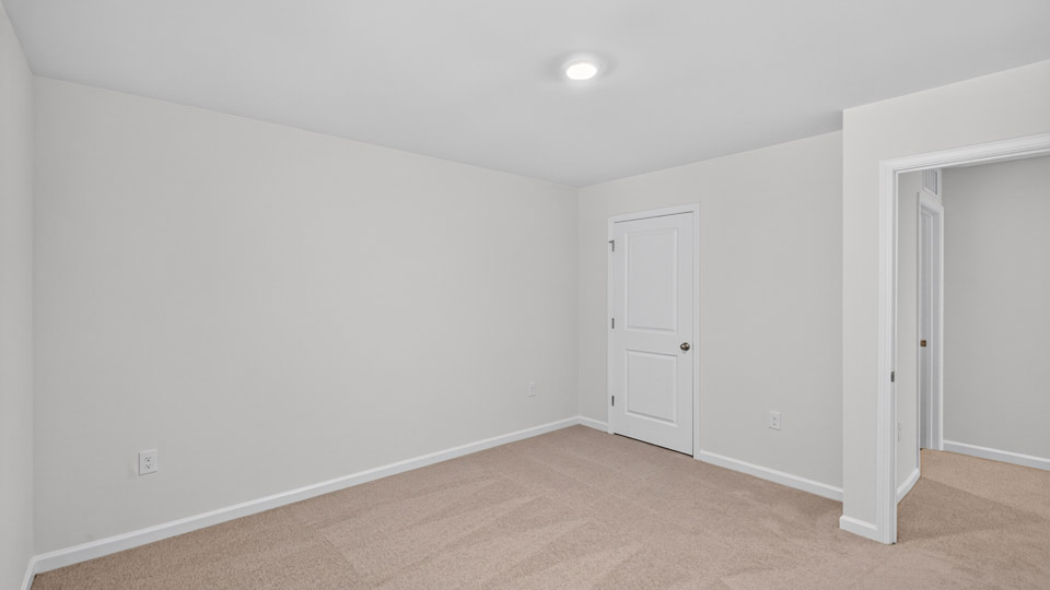 Bedroom with carpet flooring