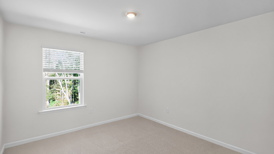 Bedroom with carpet flooring