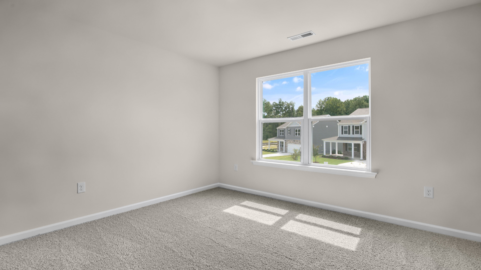 Bedroom with carpet flooring