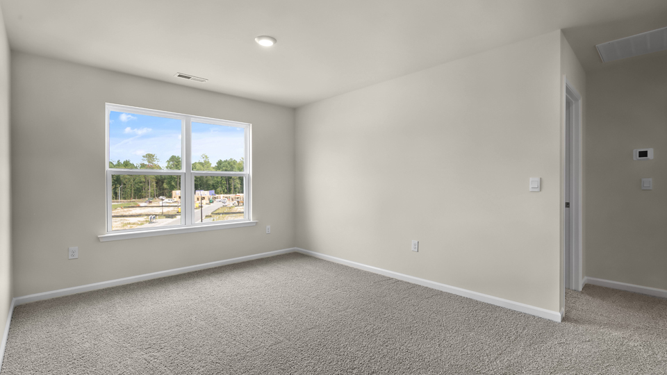 Loft with carpet flooring