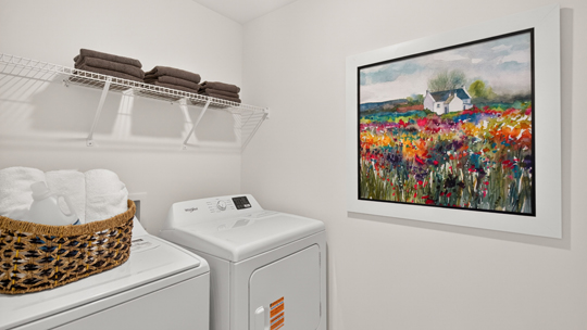 laundry room with washer and dryer