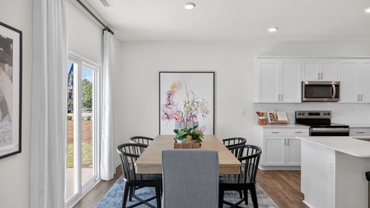 breakfast area next to sliding glass doors