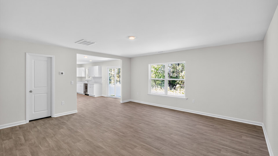 living room with revwood flooring
