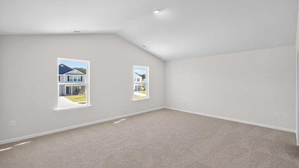 bedroom with vaulted ceiling
