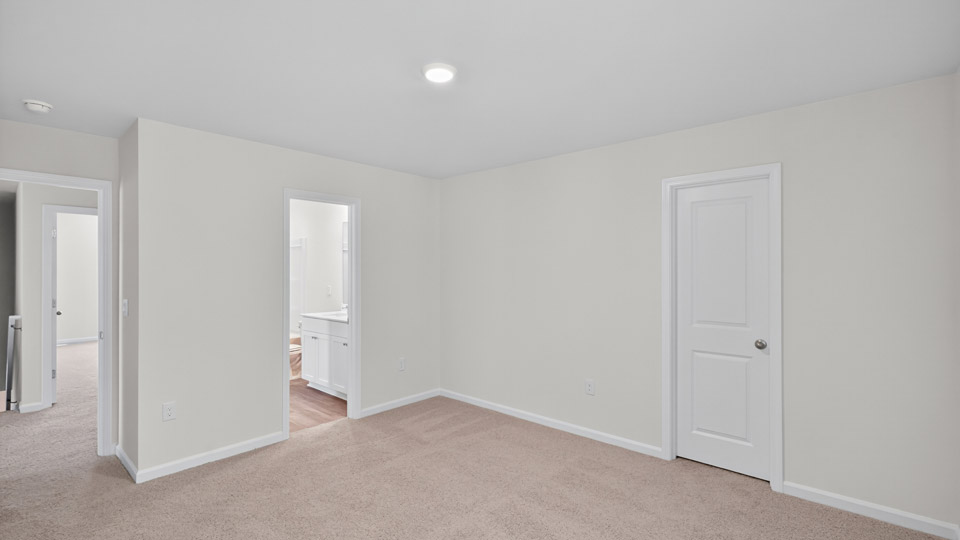loft with carpet flooring