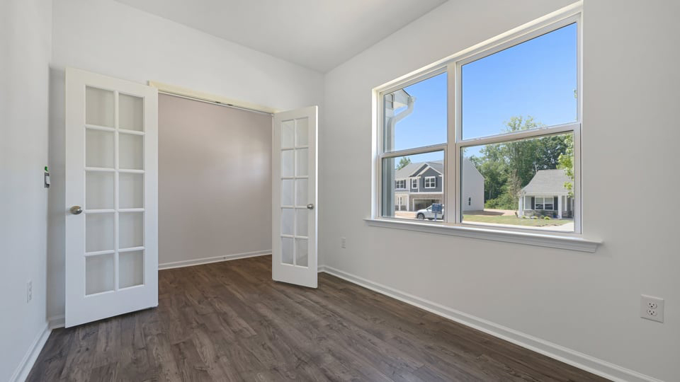 flex room with large windows, french doors