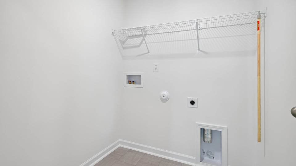 laundry room with wire shelving