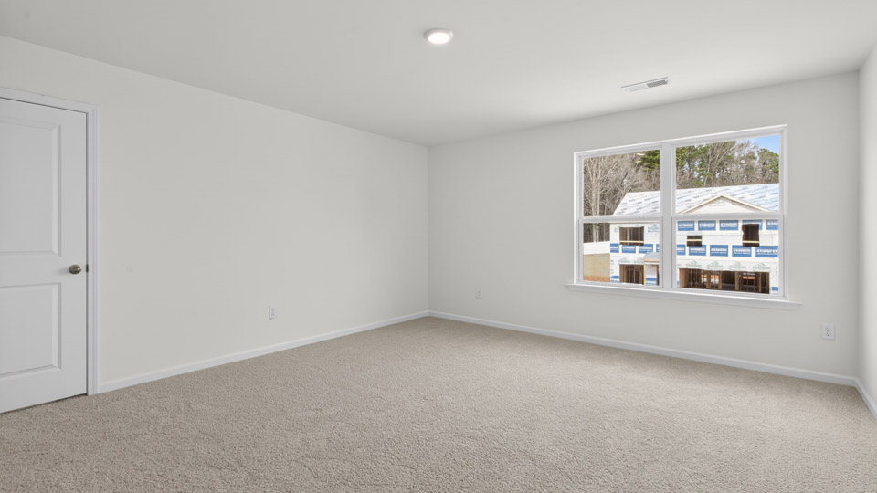 Bedroom with carpet floor and closet