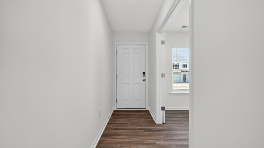 foyer entryway with revwood flooring