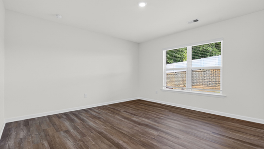 living room with revwood flooring