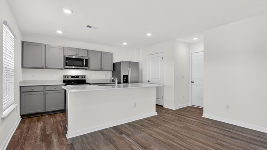 kitchen with gray cabinets quartz countertops and gray cabinets
