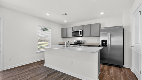 kitchen with gray cabinets quartz countertops and gray cabinets