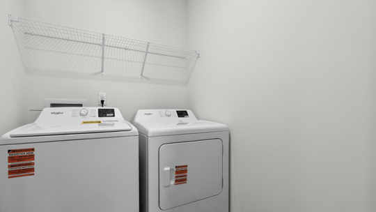 laundry room with washer and dryer
