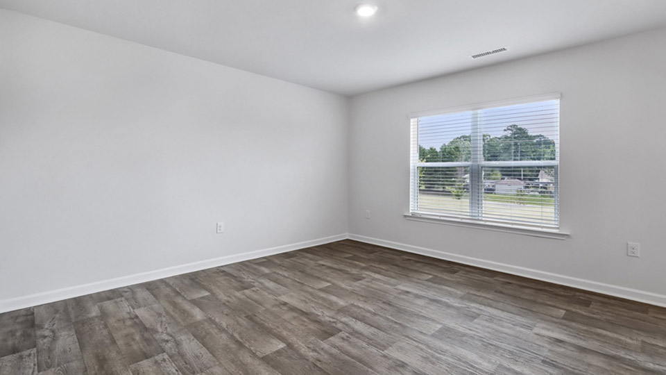 open concept living room with vinyl flooring