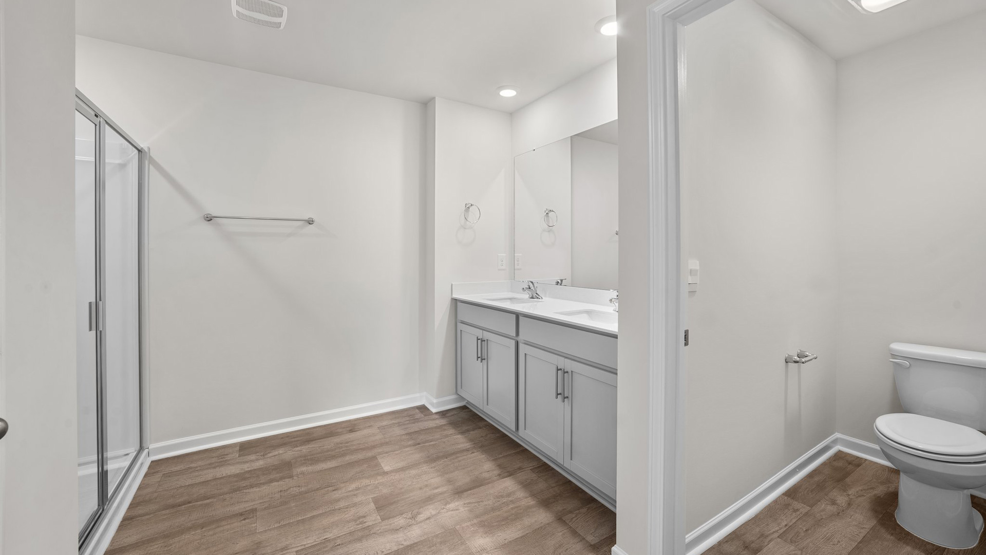 Bathroom with grey cabinets