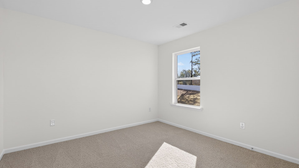 Bedroom with carpet floor and closet
