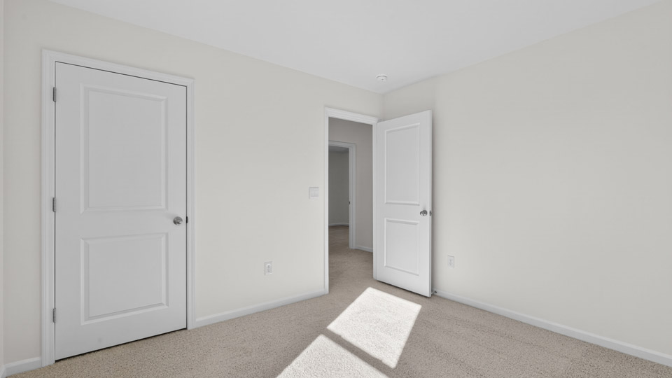 Bedroom with carpet floor and closet