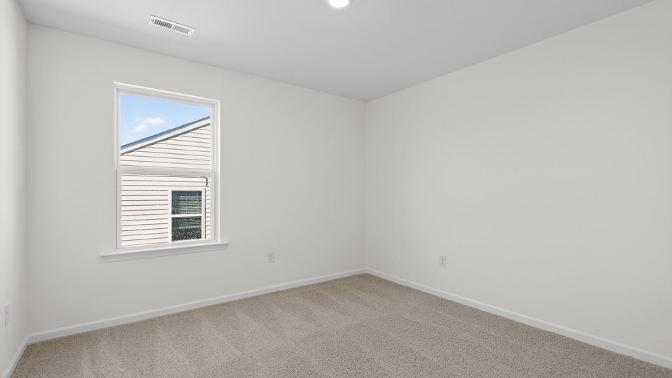 Bedroom with carpet floor and closet