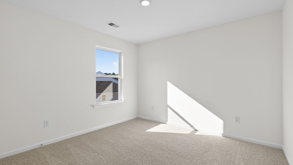 Bedroom with carpet floor and closet