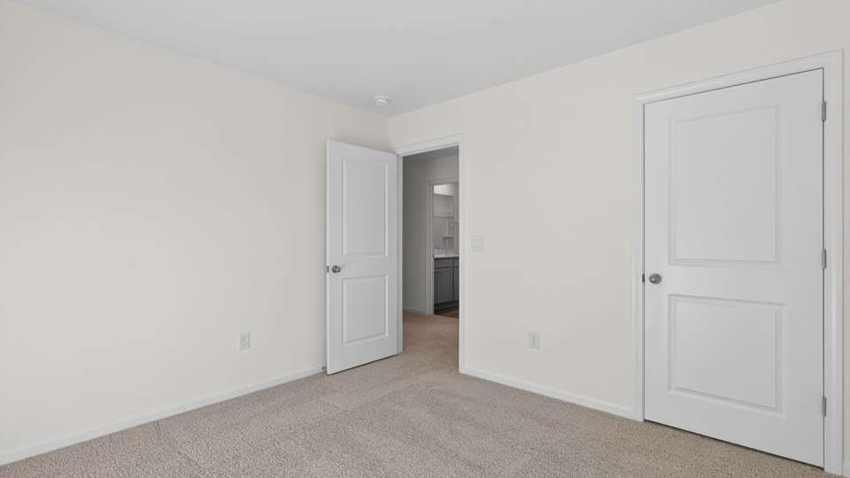 Bedroom with carpet floor and closet