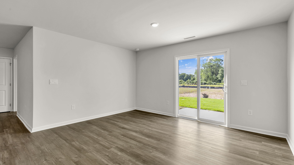 open concept living space with large windows