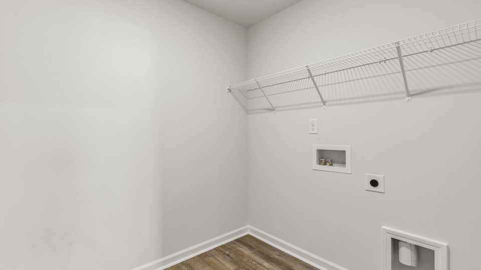laundry room with wire shelving