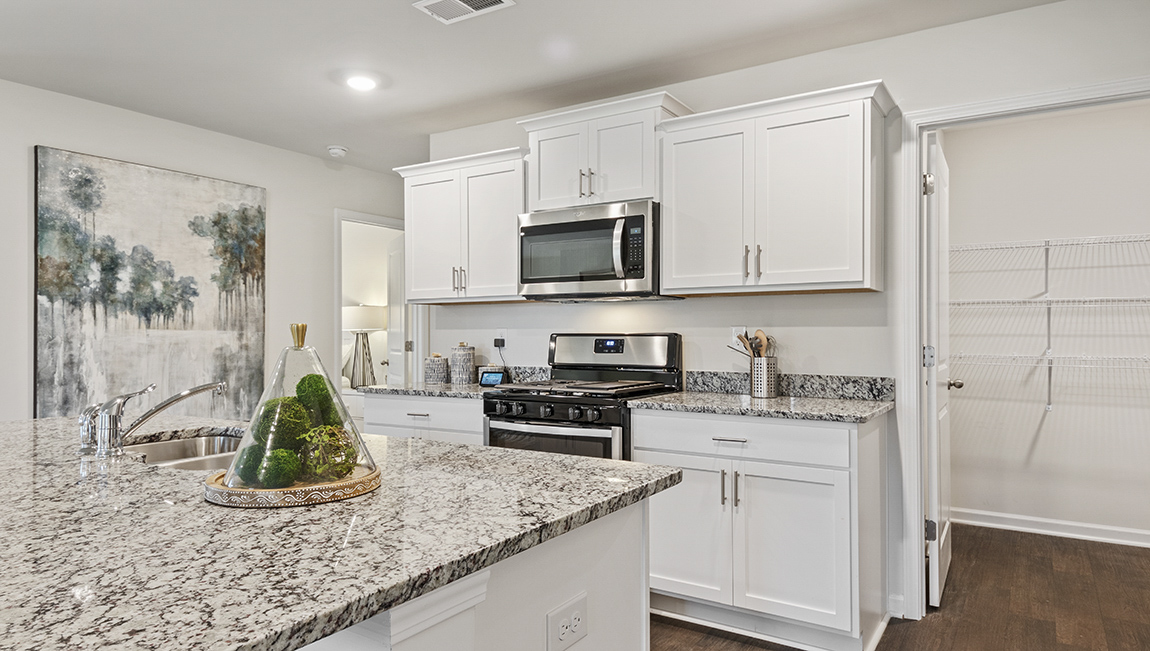 kitchen with stainless steel appliances and quartz countertops
