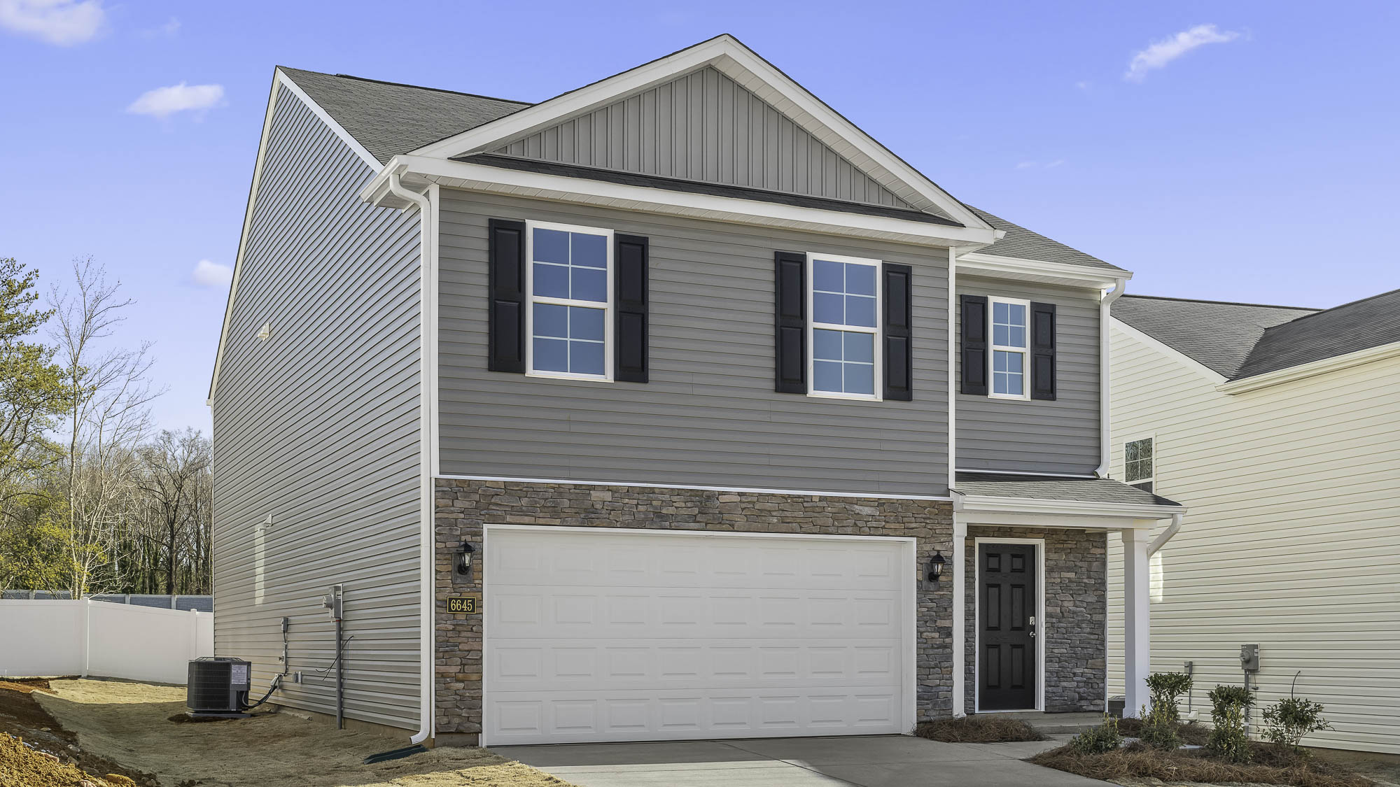 Come tour the Robie at 93 Cheyenne Dr., Clayton, NC at Lawson Glen!  Welcome to Lawson Glen, a new home coming soon to  the booming town of Clayton, NC. This community offers single family floorplans with all the features you've been searching for.  The Robie is a spacious two-story home showcased at our Lawson Glen community, located in Clayton, NC, offering 3 modern elevations. The Robie boasts 2,361 sq. ft. of living space, 5 bedrooms, 3 bathrooms, and a 2-car garage.   The moment you step inside the home you're greeted by an inviting foyer which connects you first past the staircase, then a storage closet, before opening into the living and dining rooms, which are overlooked by the kitchen. The kitchen features stainless steel appliances, a functional center island, and a corner walk-in pantry. Off the kitchen, in the back left corner of the home, is a guest bedroom and a separate full bathroom across from the guest room.   Upstairs, you'll find the primary bedroom with a spacious primary bathroom featuring a large walk-in closet, dual vanity, and a separate water closet for ultimate privacy. The additional 3 bedrooms upstairs provide comfort and privacy with access to a full secondary bathroom. The loft offers a flexible space that can be used as a media room, playroom, or become a fourth bedroom. The laundry room completes the second floor.   Residents will enjoy the future amenities including a playground, dog park, fitness park, walking trail, and a picnic shelter. As you step inside one of our homes, prepare to be captivated by the attention to detail and high-quality finishes throughout. The open floorplan designs are perfect for entertaining, while the LED lighting adds a modern touch and creates a warm, inviting ambiance. The exterior schemes and elevations of our homes were carefully designed to create a beautiful streetscape that you'll be proud to call home.   At Lawson Glen, we understand the importance of modern living. That's why each home is equipped with smart home technology, putting convenience and control at your fingertips. Whether adjusting the temperature or turning on the lights, managing your home has never been easier.  With its thoughtful design and spacious layout, the Robie is the perfect place to call home at Lawson Glen. Contact us today to schedule a tour!  * Photos are not of actual home or interior features and are representative of floor plan only. *