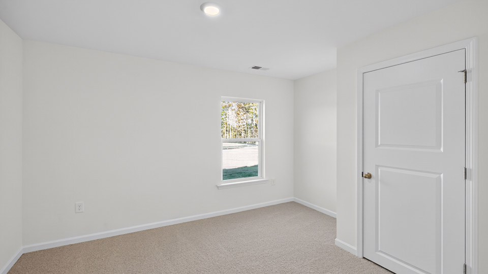 Bedroom with carpet floor and closet
