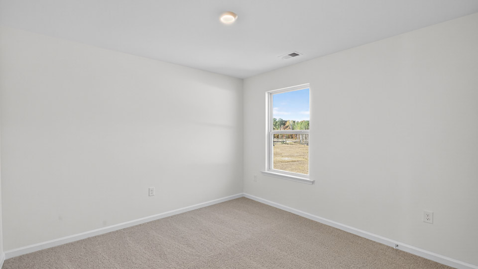 Bedroom with carpet floor and closet