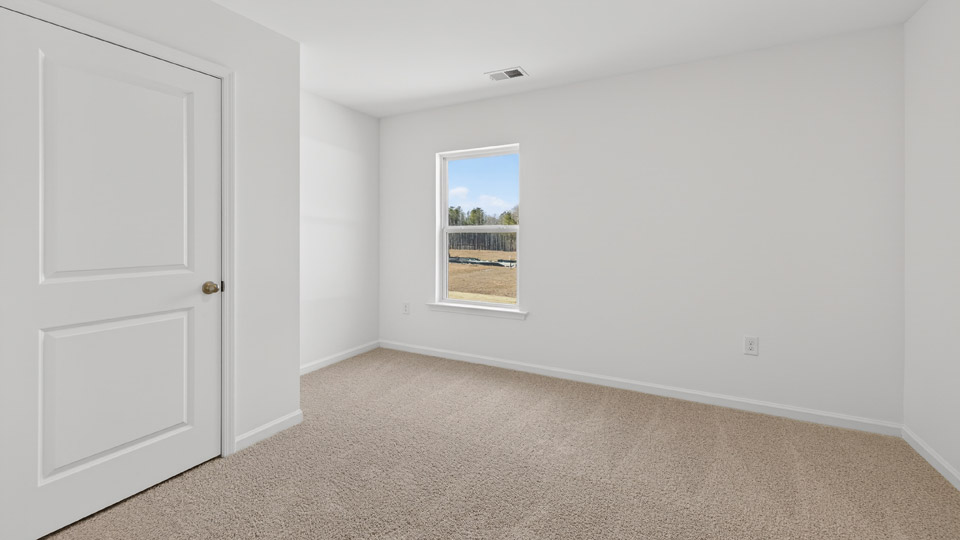 Bedroom with carpet floor and closet