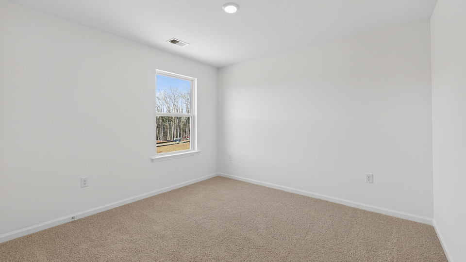 Bedroom with carpet floor and closet