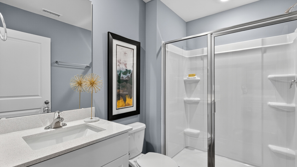 bathroom with quartz countertops