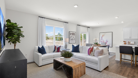 open concept living room with revwood flooring