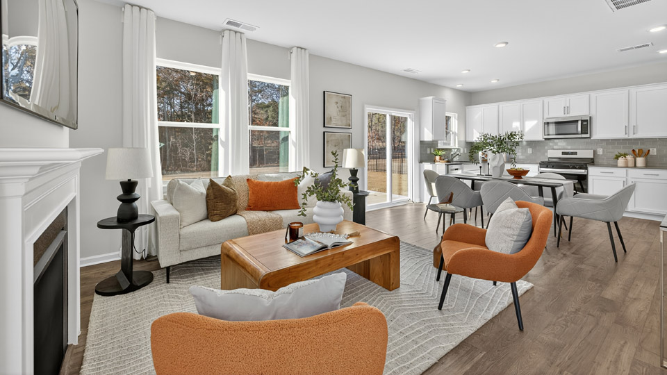 living room with revwood flooring and fireplace