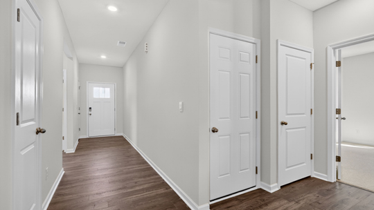 foyer entryway with revwood flooring