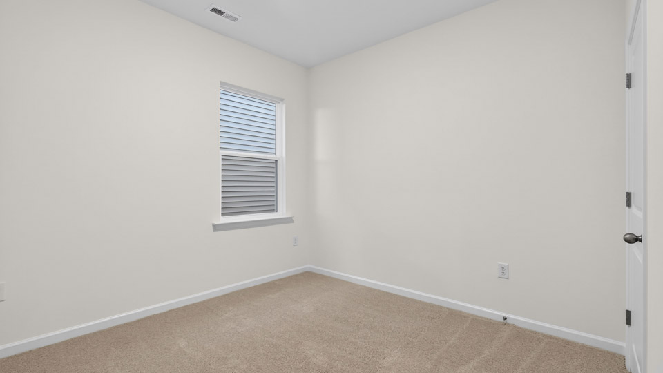 Bedroom with carpet floor and closet