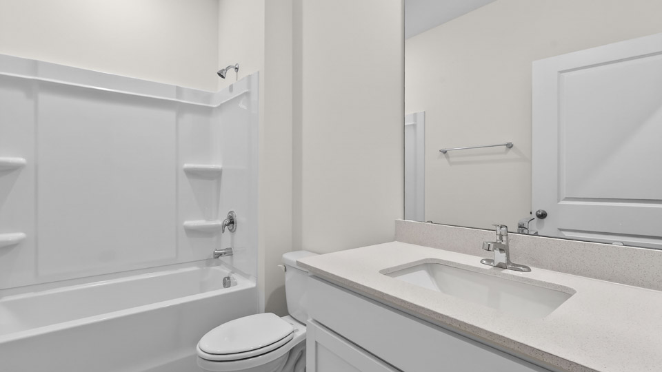 Bathroom with sink and tub