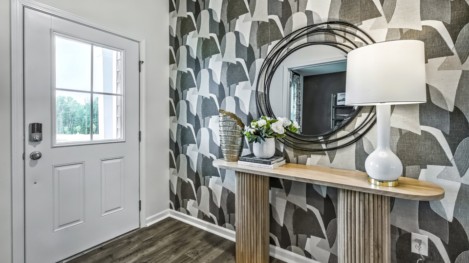 foyer entryway with revwood flooring